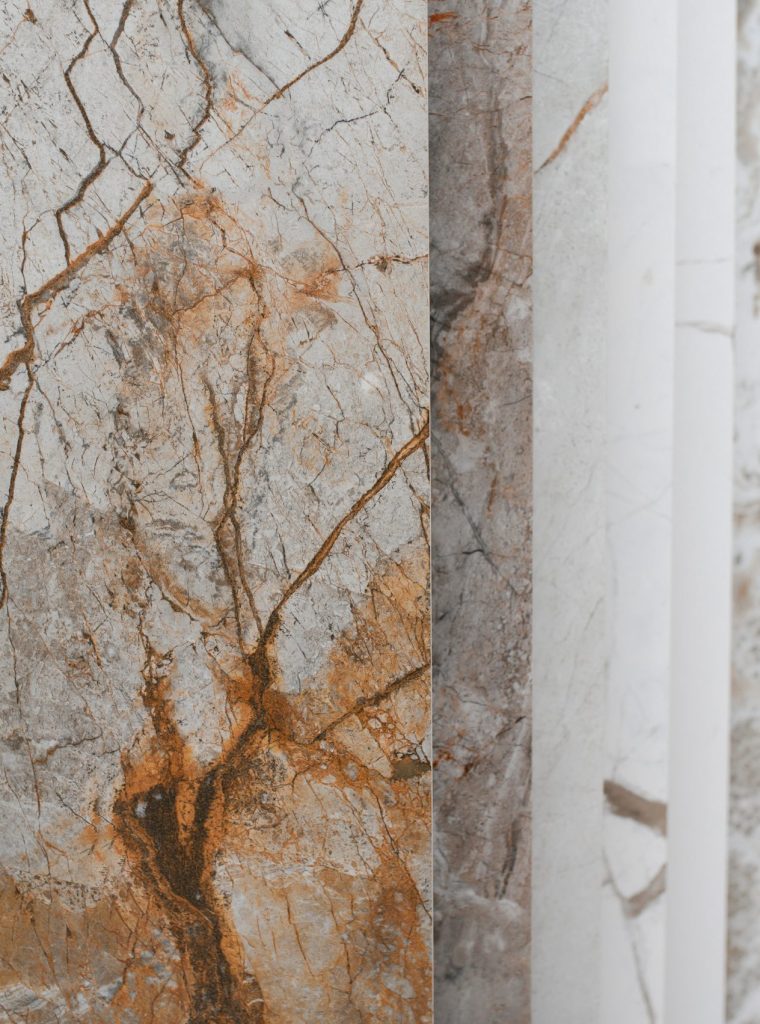 Large assortment of floor tiles or a selection at a hardware store. Repair material